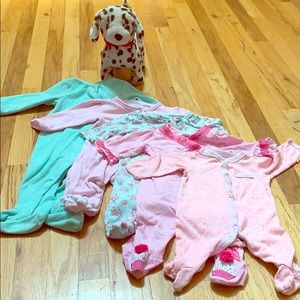 Five one piece footies sizes 0-9 months.